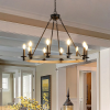 Rustic Farmhouse 10-Light Candle Chandelier, Black Metal and Wood Round Hanging Light Fixture for Dining Room, Kitchen, Living Room, Adjustable H